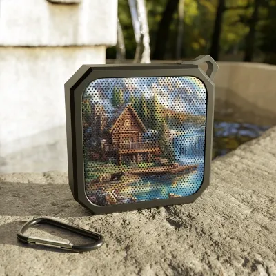 lakeside-cabin-outdoor-bluetooth-speaker-outside.webp